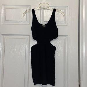 Bebe mini black dress cut out on sides